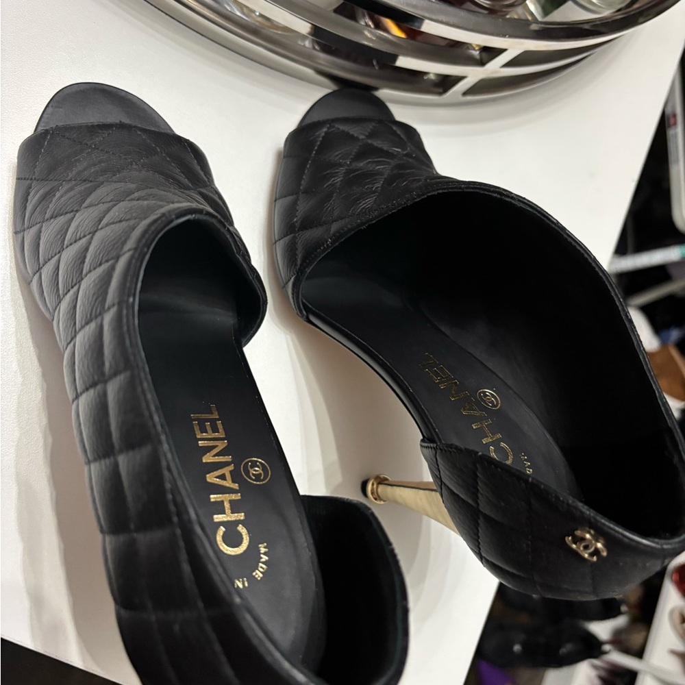 CHANEL Black Quilted Heels with Gold Accents
